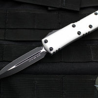 Microtech UTX-85 OTF Knife- Double Edge- Clear Finished Handle- Black Blade 232-1 CR