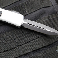 Microtech UTX-85 OTF Knife- Double Edge- Clear Finished Handle- Black Blade 232-1 CR