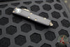 Microtech UTX-85 OTF Knife- Tanto Edge- Black Handle- Apocalyptic Full Serrated blade 233-12 AP