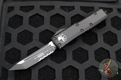 Microtech UTX-85 OTF Knife- Tactical- Tanto Edge- Black Handle- Black Part Serrated Blade 233-2 T