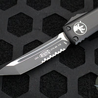 Microtech UTX-85 OTF Knife- Tactical- Tanto Edge- Black Handle- Black Part Serrated Blade 233-2 T
