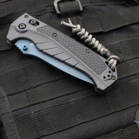 Benchmade 18060SBT-01 Adira Axis Lock Folding Knife- Tempest Gray Polymer Handle- Magnacut Cerakoted Titanium Blue Finished Serrated Blade 18060SBT-01