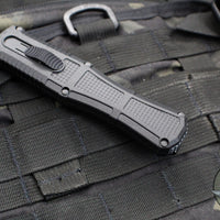 Benchmade Claymore OTF Auto Knife- Double Edge- Black Body- Gray Part Serrated Edge Blade 3370SGY