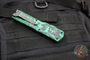 Heretic Colossus OTF Auto- Recurve Edge- USN SHow 2023- Breakthrough Green Handle- Battle Black Plain Edge