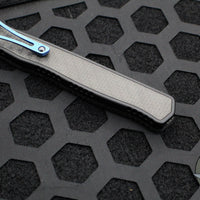 Heretic Cleric 2 OTF Auto- Double Edge- Carbon Fiber Top- Carbon Fiber Inlay Bottom Handle- Blue Hardware Accents- Stonewash Full Serrated Edge Blade H020-2C-CF/BLU