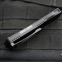 Heretic Manticore-S OTF Auto Knife- Tactical- Tanto Edge- Black Handle- Black Dlc Full Serrated Edge H023-6C-T
