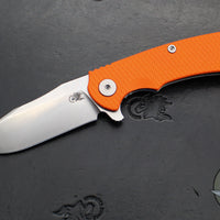 Hinderer Project X- Clip Point Edge- Stonewash Finished Titanium And Orange G-10- Stonewash S45VN Blade