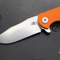 Hinderer Project X- Clip Point Edge- Stonewash Finished Titanium And Orange G-10- Stonewash S45VN Blade