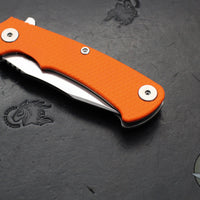 Hinderer Project X- Clip Point Edge- Stonewash Finished Titanium And Orange G-10- Stonewash S45VN Blade