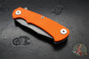 Hinderer Project X- Clip Point Edge- Working Finish Titanium And Orange G-10- Working Finish S45VN Blade