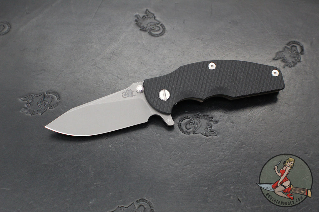 Hinderer Jurassic- Slicer Edge- Hollow Grind- Battle Bronze Titanium and Various G-10 Handle Scales- Working Finish Magnacut Steel Blade