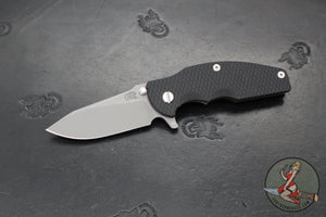 Hinderer Jurassic- Slicer Edge- Hollow Grind- Battle Bronze Titanium and Various G-10 Handle Scales- Working Finish Magnacut Steel Blade