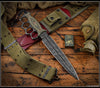RMJ Lady Death- Knuckle Duster Trench Knife- Acid Etched Finished- Dirty Olive G-10- Green Canvas and Oxblood Leather Sheath