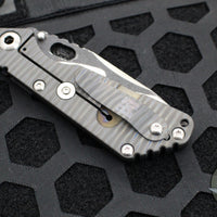 Mick Strider Custom SnG Folder- Drop Point- Nightmare Grind- SERRATED And Scalloped- Blackened Flats- Black Tire Tread G-10 And Flamed Titanium Handle