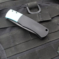 Protech Magic "Whiskers" Out The Side (OTS) Auto- Hidden Bolster Release Knife- Black Body- Textured Turquoise Bolster- Black DLC Blade BR-1.7 LTD-T Blue