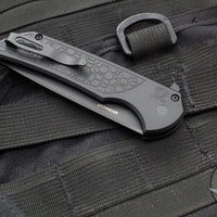 Protech Mordax Flipper- Gridlock Textured Black Handle- Black DLC Magnacut Blade MX106-Gridlock