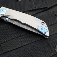 Spartan Blades- Harsey 3.25" Folder- Stonewashed Titanium- Chad Nichols Damascus Blade- Blue HW SF10DMBL v2