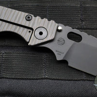 Strider SMF Folder- Drop Point- Black Textured G-10 And Flamed Titanium- Black Finished Magnacut Blade