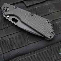 Strider SMF Folder- Drop Point- Black Textured G-10 And Flamed Titanium- Black Finished Magnacut Blade