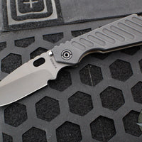 Strider Knives SMF- Drop Point- Shot Show 2025- Veni Vidi Vici- Black Slotted Aluminum And Flamed Ti- Black Magnacut Blade