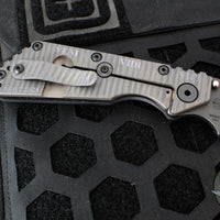 Strider Knives SMF- Drop Point- Shot Show 2025- Veni Vidi Vici- Black Slotted Aluminum And Flamed Ti- Black Magnacut Blade