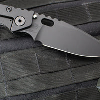 Mick Strider Performance Series SMF Folder- Black Slotted Titanium Handle- Black Finished Magnacut Blade- Black Hardware