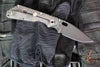 Mick Strider SnG Folder- Spearpoint- Contoured Black G-10/ Flamed Titanium- Black 20CV Steel Blade