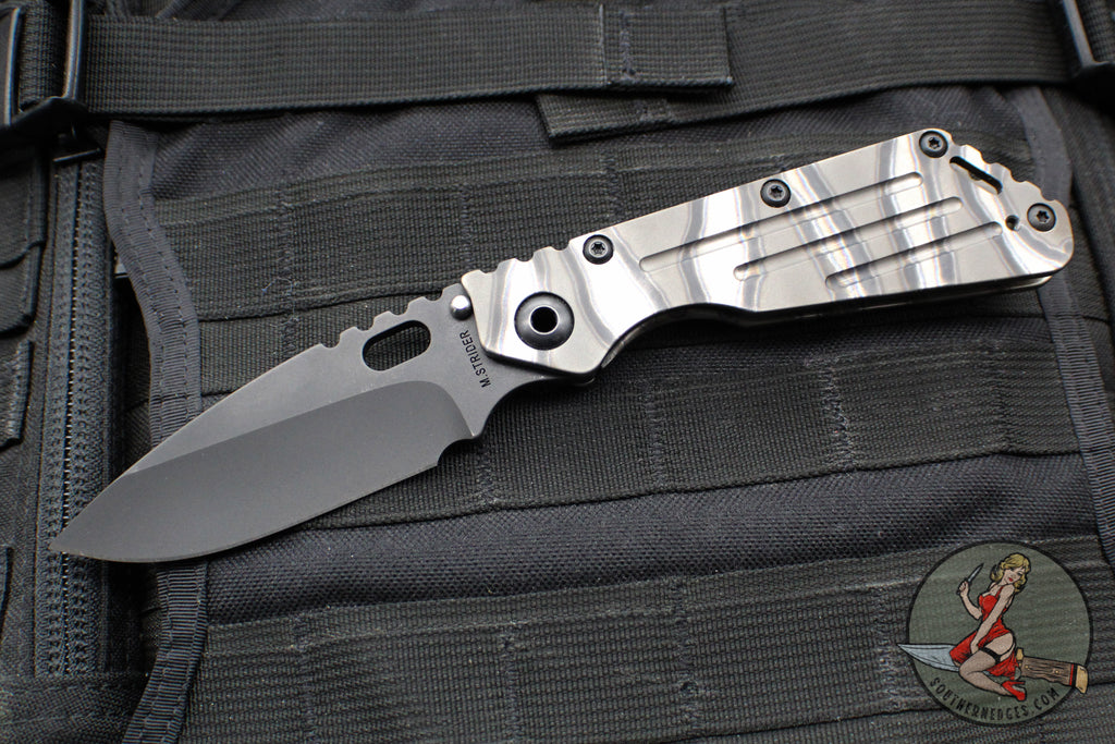 Mick Strider Performance Series SMF Folder- Drop Point- Slotted Ghost Flamed Titanium Handle- Black Magnacut Blade