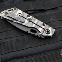 Mick Strider Performance Series SMF Folder- Drop Point- Slotted Ghost Flamed Titanium Handle- Black Magnacut Blade