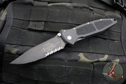 Vintage 10/1998 Microtech MINI Socom Elite- Manual- Black Handle- Black Part Serrated Blade