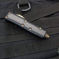 Microtech OTF Knife- Daytona- Double Edge- Black With Carbon Fiber Inlay- Bronzed Blade 126-13 CFIS