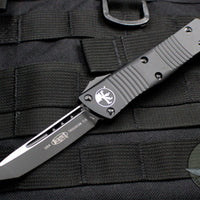 Microtech Troodon Tactical Tanto Edge OTF knife Black with Black Plain Edge Blade 140-1 T