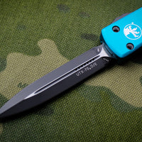 Microtech UTX-70 Turquoise Double Edge (OTF) Black Blade 147-1 TQ
