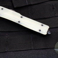 Microtech UTX-70 OTF Knife- Single Edge- Jade Green G-10 Handle Top- Black Part Serrated Blade 148-2 GTJGS
