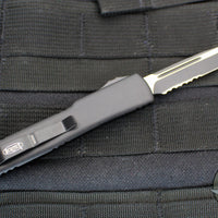 Microtech UTX-70 OTF Knife- Single Edge- Tactical- Black Handle- Black Part Serrated Blade 148-2 T