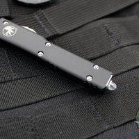 Microtech UTX-70 OTF Knife- Tanto Edge- Black Handle- Stonewash Full Serrated Blade 149-12