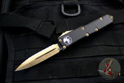 Microtech UTX-85 Double Edge OTF Knife Black with Bronzed Full Serrated Blade 232-15