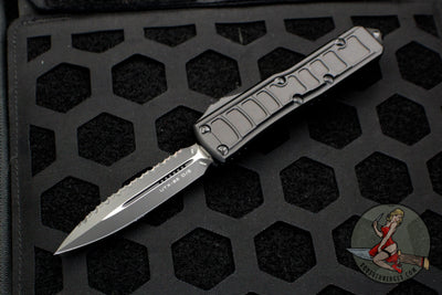 Microtech UTX-85 II OTF Knife- Stepside- Double Edge- Black Tactical Handle- Black Full Serrated Blade 232II-3 TS
