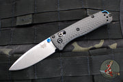 Benchmade Mini Bugout- Carbon Fiber Handle- Stonewash Plain Edge- Blue Thumbstud and Backspacer 533-3