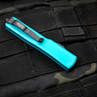 Microtech CALIFORNIA LEGAL Turquoise UTX-70 Double Edge (OTF) Black Blade CA147-1 TQ