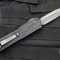 Heretic Colossus OTF Auto- Double Edge- Black Handle with Fat Carbon Snakeskin Button inlay- Hand Ground Black DLC Finished Blade SN075