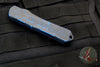Heretic Manticore-E OTF Auto- Recurve Edge- Breakthrough Blue Handle with Battleworn Black Blade and Hardware H029-8A-BRKBLU