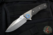Heretic Wraith Manual Flipper- V3 Prototype- Single Edge- Battleworn Titanium and Carbon Fiber Handle- Battleworn Blade- Blue Titanium Pivot Collar And Lock Limiter