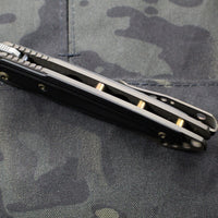 Munroe Knives custom Basilisk Bronzed Titanium and Black G-10