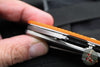 Hinderer Project X- Clip Point Edge- Stonewash Finished Titanium And Orange G-10- Stonewash Magnacut Blade